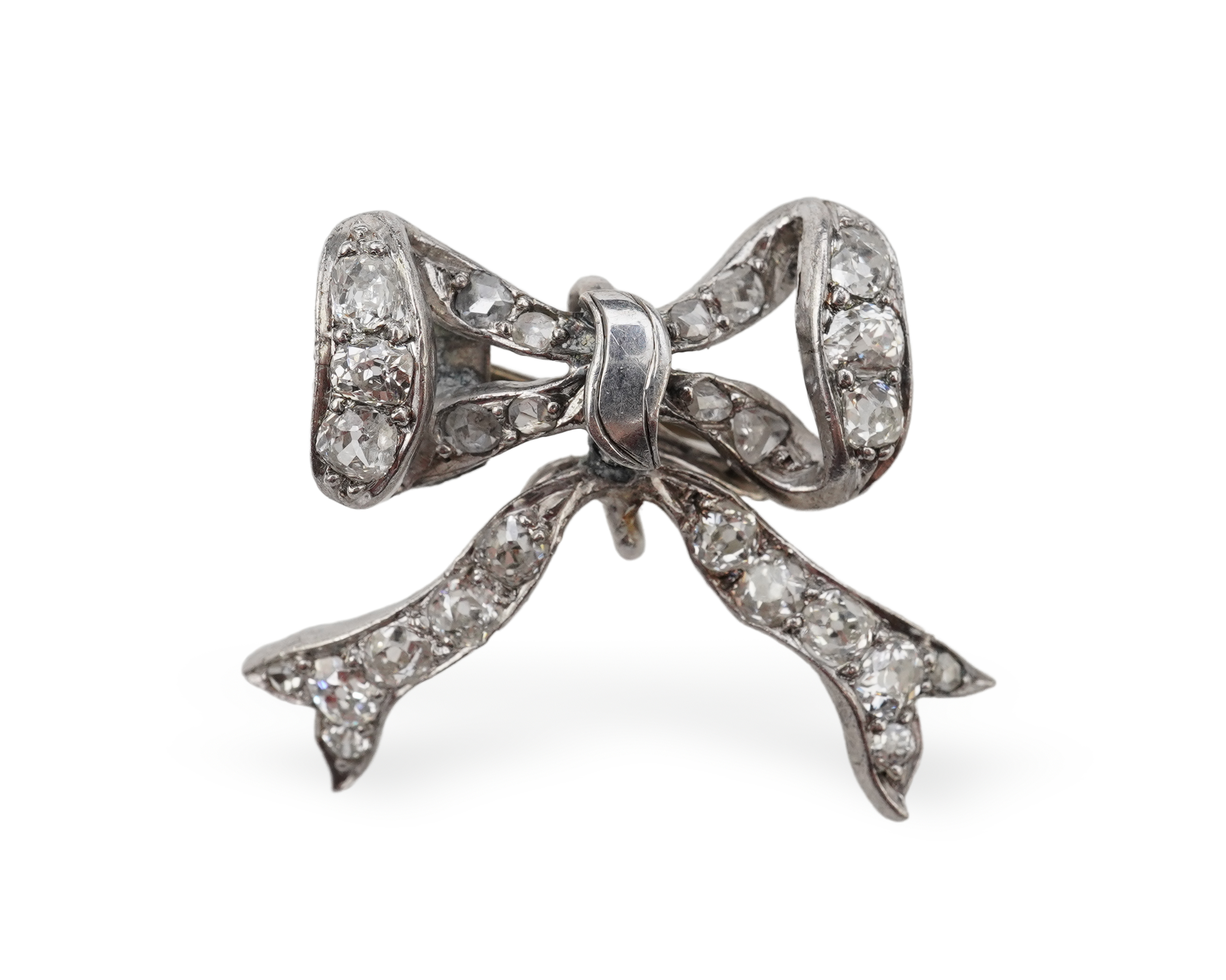 A diamond brooch, late 19th century and later